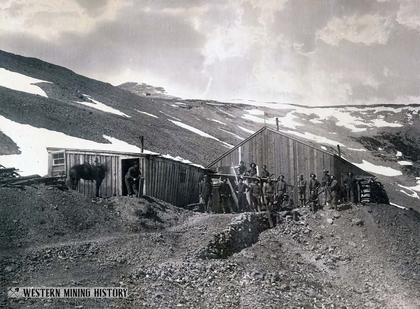 Miners pose at mine near Alma, Colorado