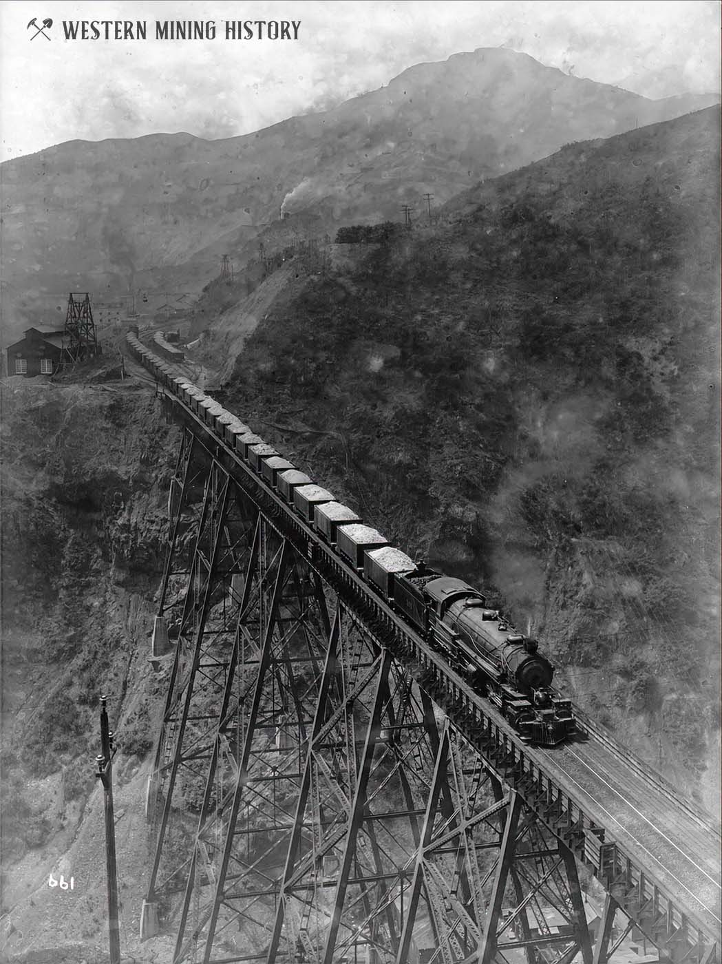 Train hauls ore at the Bingham Mine ca. 1914