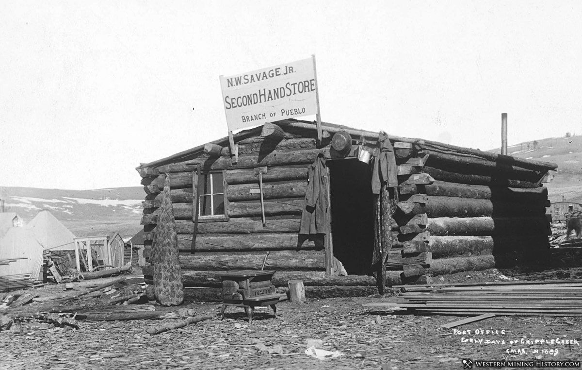 Cabin and second hand store at Cripple Creek ca. 1892