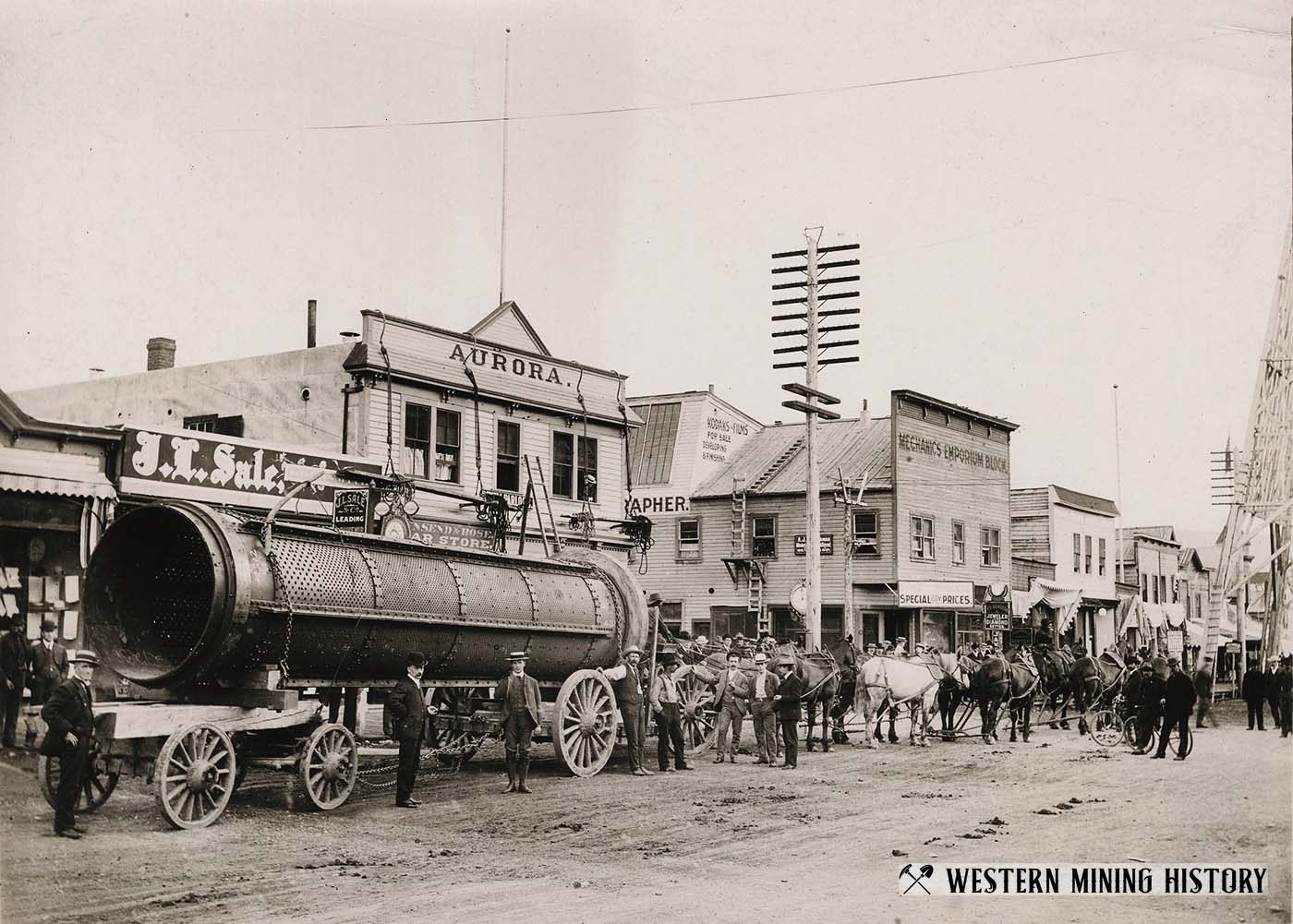 Large Trommel is being hauled through Dawson City ca. 1905