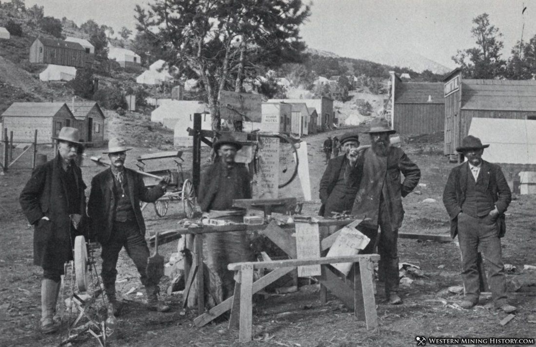 Merchant sells goods and services outdoors at Manhattan, Nevada ca. 1906
