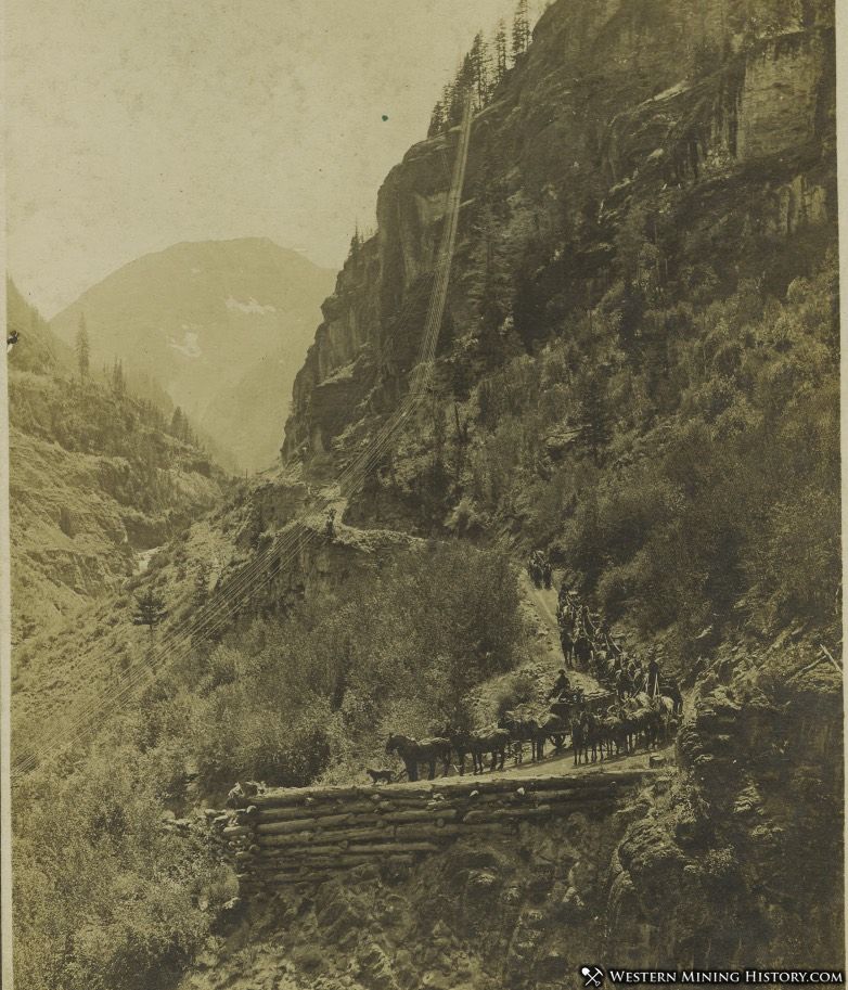 Wagon teams descending the road into Ouray, Colorado ca 1890s