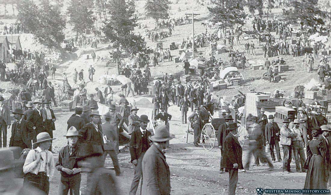 Homeless residents of Victor gather with their belongings after the big fire - August 21, 1899