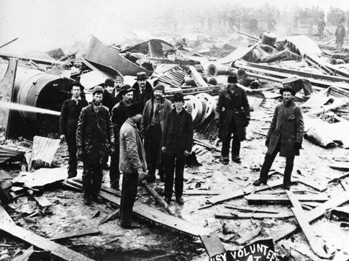 Volunteers help sort through the devastation of the 1895 explosion in Butte, Montana