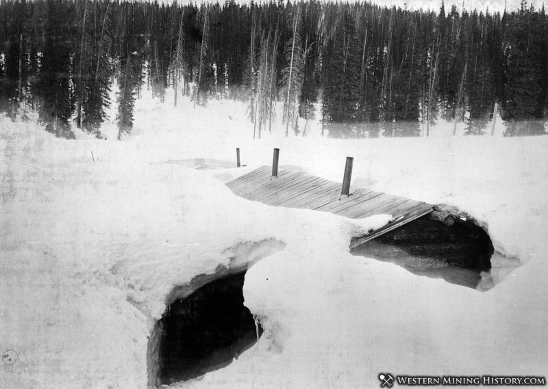 Miners cabin is buried in snow somewhere in Colorado ca. 1890