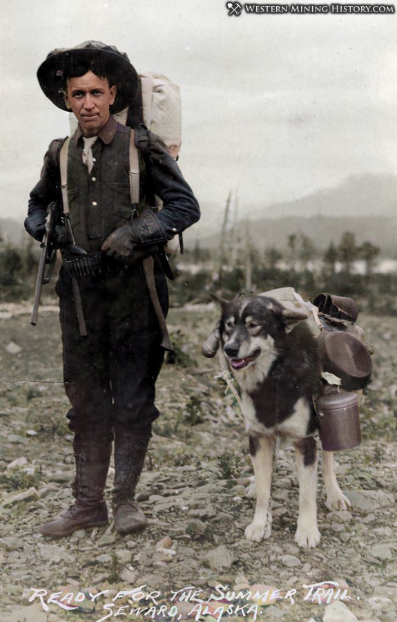 Prospector with his dog near Seward, Alaska 1900-1916